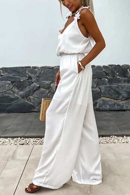 NOËLLE™ | Mouwloze jumpsuit met wijde pijpen