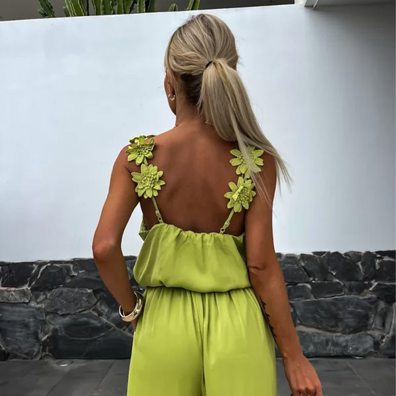 NOËLLE™ | Mouwloze jumpsuit met wijde pijpen