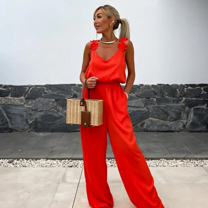 NOËLLE™ | Mouwloze jumpsuit met wijde pijpen